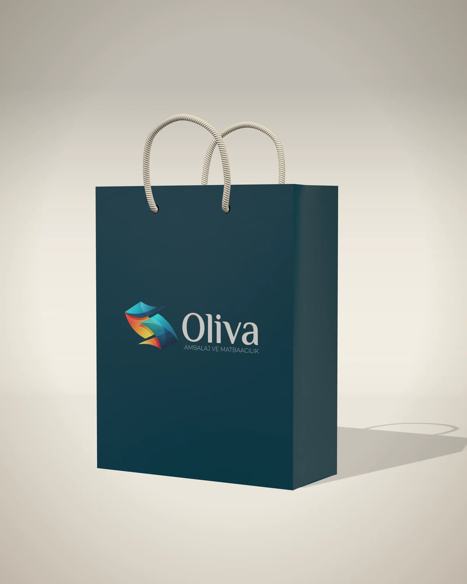 Petrol mavisi karton çanta, açık renk ip saplar ve OLIVA logo baskısı